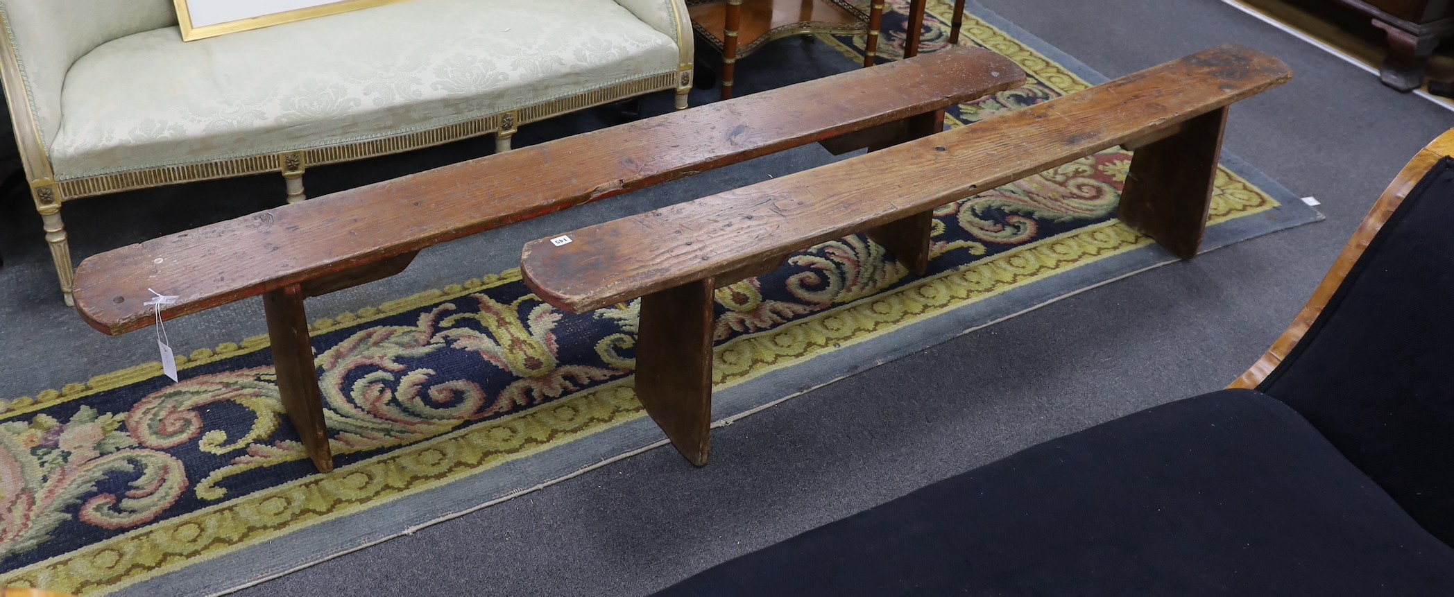 A pair of 19th century provincial elm bench seats, length 199cm, height 46cm